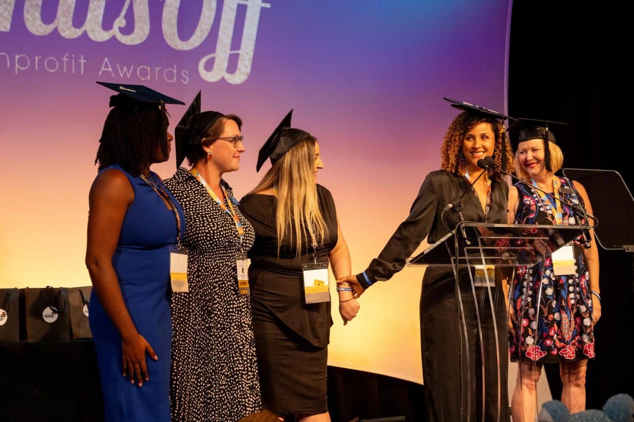 Christine Sylvain on stage at Pathway Out Nonprofit Awards ceremony